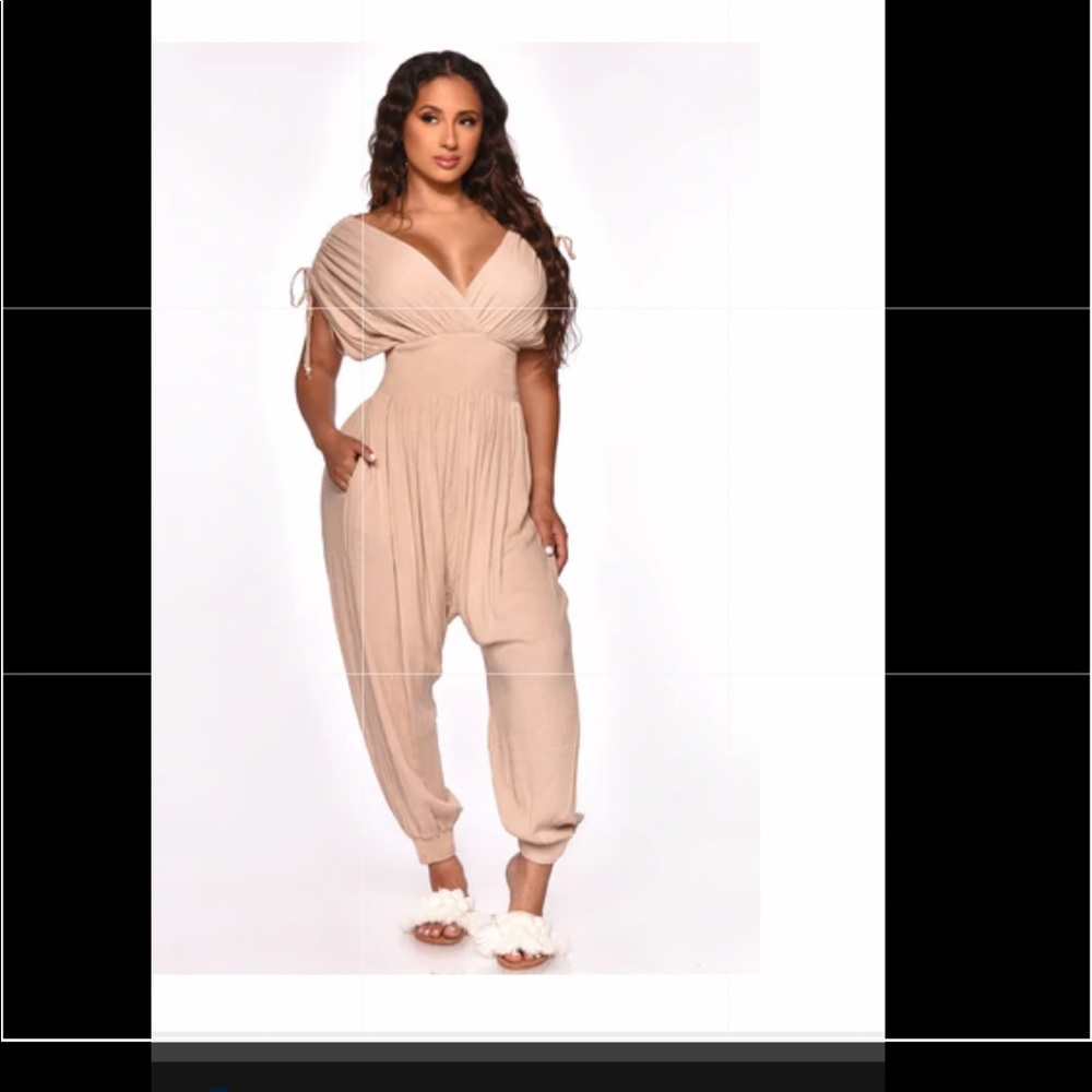 Cream colored jumpsuit. Worn once